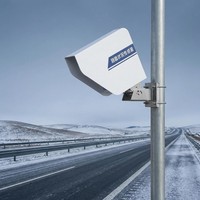 OHTS1120 real world application installed on pole monitoring snowy highway road surface conditions